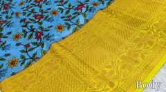 CODE WS262 :  Blue colorful floral printed paper silk saree ,contrast bright yellow zari woven  border,digital printed pallu and digital printed blouse with borders.