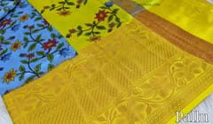 CODE WS262 :  Blue colorful floral printed paper silk saree ,contrast bright yellow zari woven  border,digital printed pallu and digital printed blouse with borders.