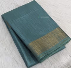 CODE WS535 :Teal blue premium linen saree with gold zari borders ,zari vertical stripes all-over ,thread and sequence woven design in pallu ( as these are handwoven, slight inconsistencies in weaving are not to be considered as defects),plain running blouse with borders