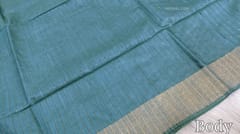 CODE WS535 :Teal blue premium linen saree with gold zari borders ,zari vertical stripes all-over ,thread and sequence woven design in pallu ( as these are handwoven, slight inconsistencies in weaving are not to be considered as defects),plain running blouse with borders