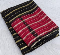 CODE WS544 : Black and red pure georgette(thin,soft and flowy fabric) shibori dyed designer saree with gold zari stripes all-over,gota pati tapings as borders,blouse with zari lines