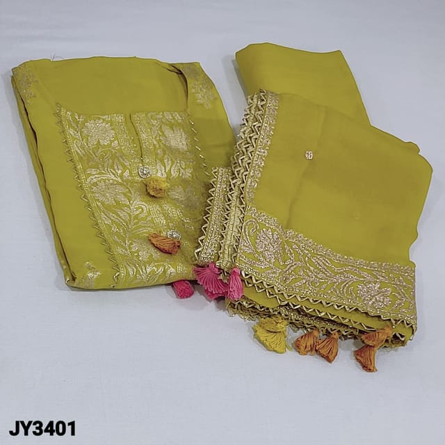 CODE JY3401 : Designer Bright Mehandhi Yellow Pure Organza Unstitched Salwar material(soft, flowy fabric, lining needed) round notch neck, zari woven design highlighted with zardozi and fancy tassels on yoke, buttas on frontside, meenakari weaving design with fancy tapings on daman, Matching Santoon Bottom, zari work done on Pure Organza Dupatta with fancy lace tapings