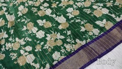 CODE WS673 : Dark green fancy silk saree(lightweight) with thin zari lines all over saree,floral printed design all over,beautiful printed pallu with sequence work, contrast running blouse with gold tissue borders.