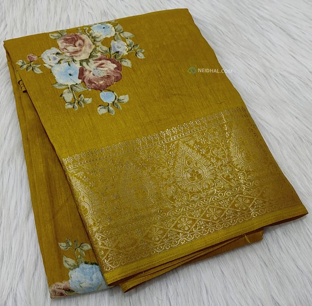 CODE WS669 : Bright mehandi yellow fancy dola silk saree(silky and lightweight) zari woven double side borders, beautiful floral prints all-over, striped pattern and floral printed pallu, plain running blouse with borders.