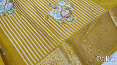 CODE WS669 : Bright mehandi yellow fancy dola silk saree(silky and lightweight) zari woven double side borders, beautiful floral prints all-over, striped pattern and floral printed pallu, plain running blouse with borders.