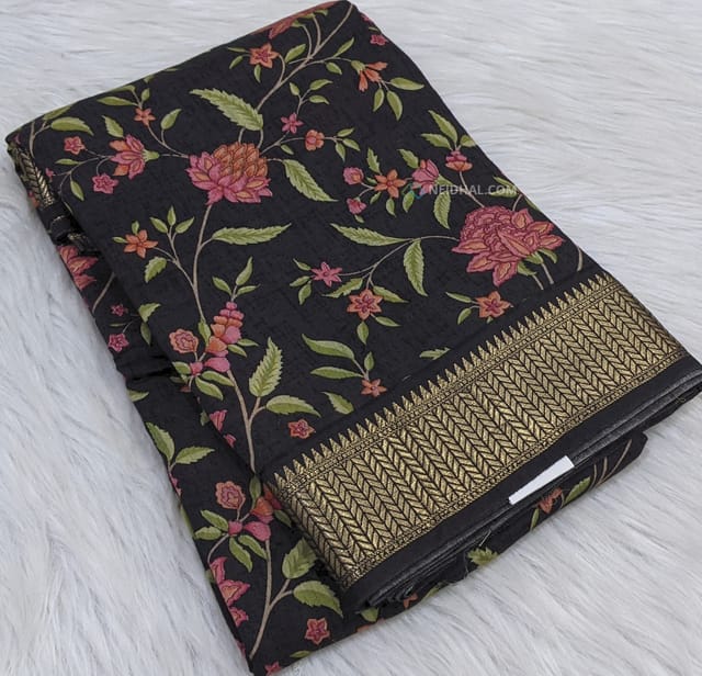 CODE WS687 : Black pure spun silk saree(soft and smooth fabric) ,beautiful digital floral prints all over with antique zari woven borders on both sides , simple zari woven pallu ,printed running blouse with borders