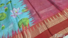 CODE WS706: Pastel blue pure kota silk saree with beautiful lotus digital prints all over, contrast red gap borders with antique gold zari woven designs, contrast pallu with zari lines,printed running blouse with gap borders.