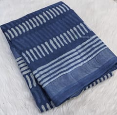 CODE WS742 :Indigo dyed block printed linen cotton saree, small silver tissue borders, hand block printed pallu with tassels and block printed running blouse with borders.