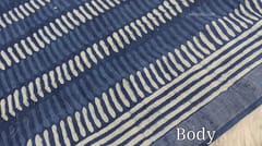 CODE WS742 :Indigo dyed block printed linen cotton saree, small silver tissue borders, hand block printed pallu with tassels and block printed running blouse with borders.