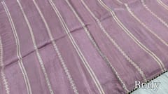 CODE WS748 : Mauve pure dola silk designer saree ( soft, silky, shiny) zari woven vertical lines all -over ,simple lacework as borders , striped pallu and contrast running blouse with zari woven design all over.