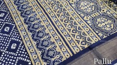 CODE WS768 : Navy blue bandhani printed fancy dola silk saree (soft and lightweight ) fancy zari woven double side borders, ajrak printed pallu and running printed blouse with borders
