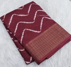 CODE WS789 : Maroon fancy dola silk saree with zig zag prints ,soft zari woven double side borders,ajrak printed pallu,bandhani printed blouse with borders.