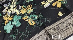 CODE WS816 : Black fancy dola silk saree(silky and light weight ),fancy zari woven double side borders, abstract floral prints all over, printed pallu , running printed blouse with borders.