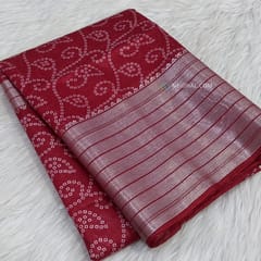CODE WS826 : Reddish maroon bandhani printed fancy silk cotton saree with silver zari woven double side borders, zari woven and printed pallu,running blouse with borders.