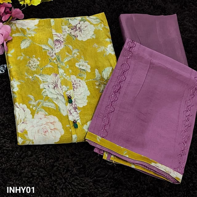 CODE INHY01 : Golden Yellow Floral Printed Silk Cotton Unstitched Salwar material(shiny, thin fabric, lining included) with fancy buttons on yoke, Matching Silk fabric provided for lining, Dark Beetroot Purple silky Bottom, thread and sequins work on soft silk cotton dupatta and tapings