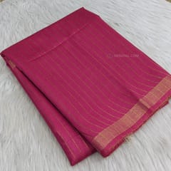 CODE WS840 :  Dark pink semi tussar saree (soft and lightweight ) vertical gold zari lines all over saree, tissue borders on both sides , sequence and thread work pallu with tassels, plain running blouse with gold tissue borders.