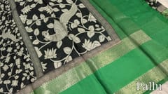 CODE WS855 :  Black base kalamkari printed pure kotas silk saree with contrast green gap borders (lightweight), peacock printed pallu with tassels, contrast running digital printed blouse.