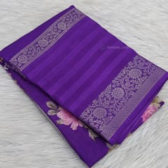 CODE WS942 : Bright purple fancy dola silk saree with beautiful floral prints all over, big gap borders on one side, ikat printed pallu,plain running blouse with borders.