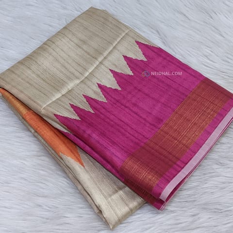 CODE WS1031: Beige semi tussar saree with dual shade temple borders(orange, pink) with gold tissue,textured pattern all over, striped pallu with tassels,plain running contrast blouse with borders.