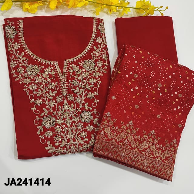 CODE JA241414 : Red pure dola silk unstitched salwar material,round neck,yoke with zari,tread and sequins work(silky,soft,lining needed)matching santoon bottom,pure dola silk bandhani printed dupatta with zari woven borders and zari buttas all over.