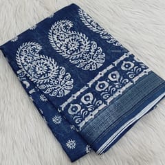 CODE WS1184 : Indigo blue fancy linen saree with beautiful digital prints all over,silver tissue borders,printed pallu with tassels,printed running blouse with soft silver tissue borders.