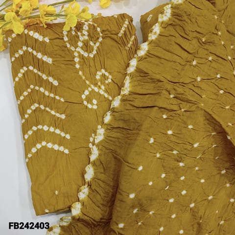 CODE FB242403 : Mehandi yellow pure cotton  unstitched salwar material, original bandhani work all over (lining needed)matching original bandhini pure cotton bottom,bandhani dupatta with cut work edges.