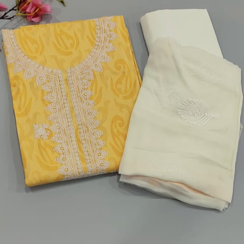 CODE D103 : Yellow jakard cotton unstitched salwar material,embroidery on yoke(lining optional)half white cotton bottom,embroidered chiffon dupatta with tapings.