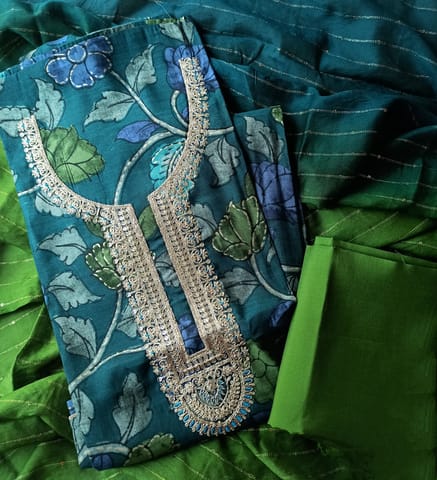 Dark peacock blue premium modal masleen unstitched salwar material, printed all over,yoke with fine zari work,parrot green silly bottom,dual shaded silk cotton dupatta with fine zari lines,sequins and printed tapings.
